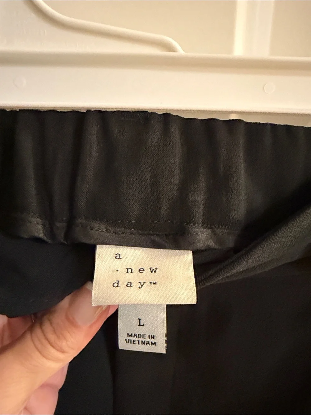 A New Day Black Midi Skirt with elastic waistband.  A-line fit.   Like new.